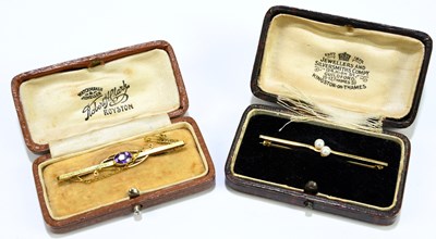 Lot 1448A - Two 9ct gold bar brooches, one set with an...