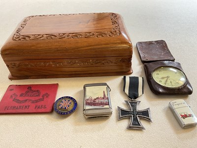 Lot 21 - A small carved box, an Iron Cross, base metal...