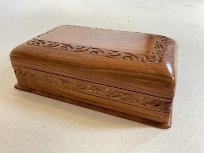 Lot 21 - A small carved box, an Iron Cross, base metal...