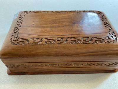 Lot 21 - A small carved box, an Iron Cross, base metal...