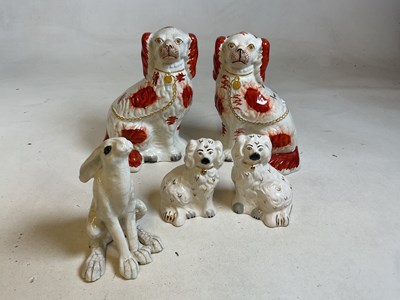 Lot 240 - A pair of 19th century Staffordshire dogs,...