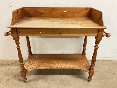 Lot 778 - An antique pine wash stand with lower shelf,...