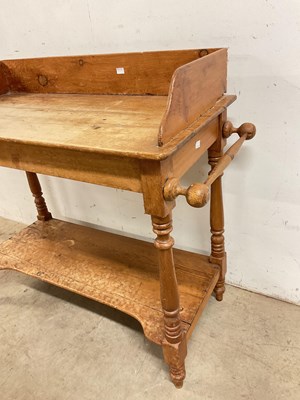 Lot 778 - An antique pine wash stand with lower shelf,...