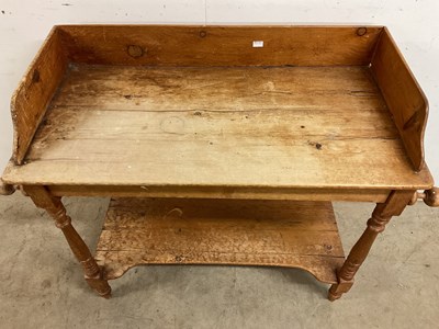 Lot 778 - An antique pine wash stand with lower shelf,...