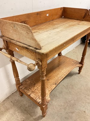 Lot 778 - An antique pine wash stand with lower shelf,...