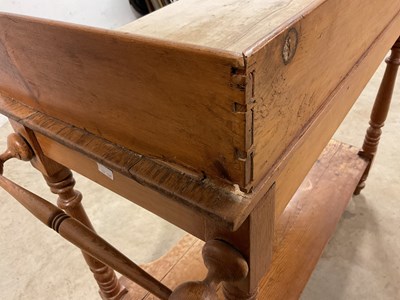 Lot 778 - An antique pine wash stand with lower shelf,...