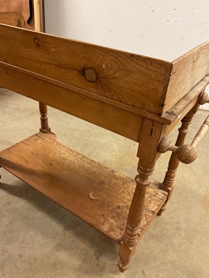 Lot 778 - An antique pine wash stand with lower shelf,...