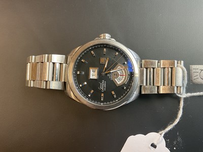 Lot 1312 - TAG HEUER; a gentleman's stainless steel Grand...