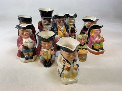 Lot 258 - ROYAL DOULTON; three character jugs, The...