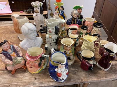 Lot 259 - A large collection of various character jugs,...