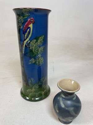 Lot 251 - A Torquay ware vase decorated with bird in...