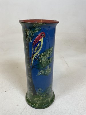 Lot 251 - A Torquay ware vase decorated with bird in...