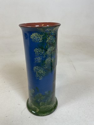 Lot 251 - A Torquay ware vase decorated with bird in...