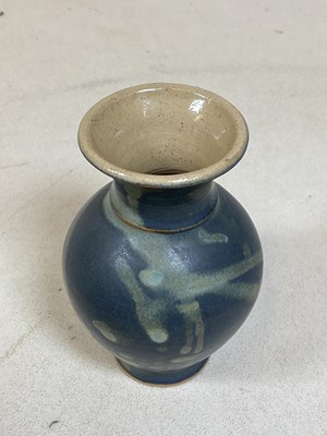 Lot 251 - A Torquay ware vase decorated with bird in...