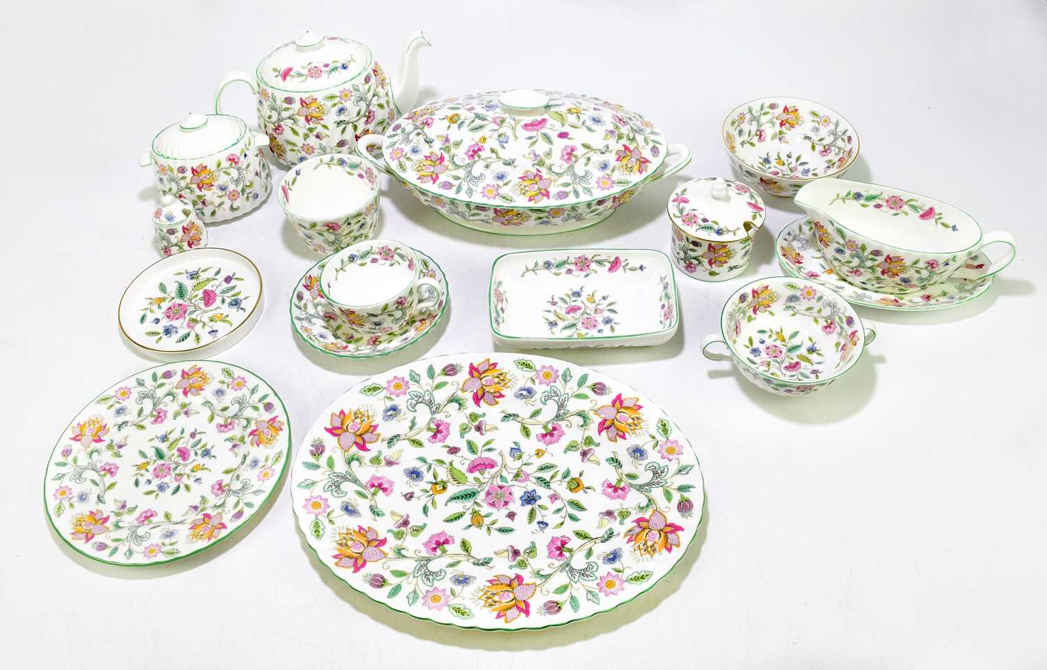 Lot 1292 - MINTON; a 'Haddon Hall' pattern dinner set,