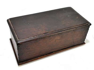 Lot 86 - An 18th century oak box with iron hinges