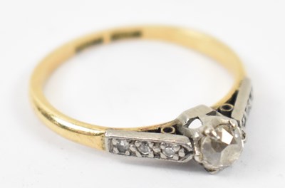 Lot 863 - An 18ct yellow gold and platinum ring, set...