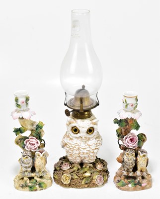 Lot 420 - A late 19th century Continental porcelain figural oil lamp