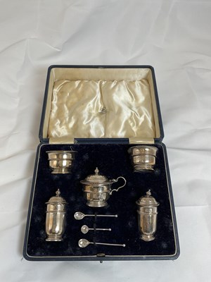 Lot 457 - A cased George V hallmarked silver five piece...