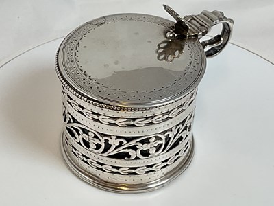 Lot 458 - A George IV hallmarked silver drum mustard...