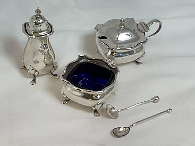 Lot 459 - A George V hallmarked silver three piece cruet,...