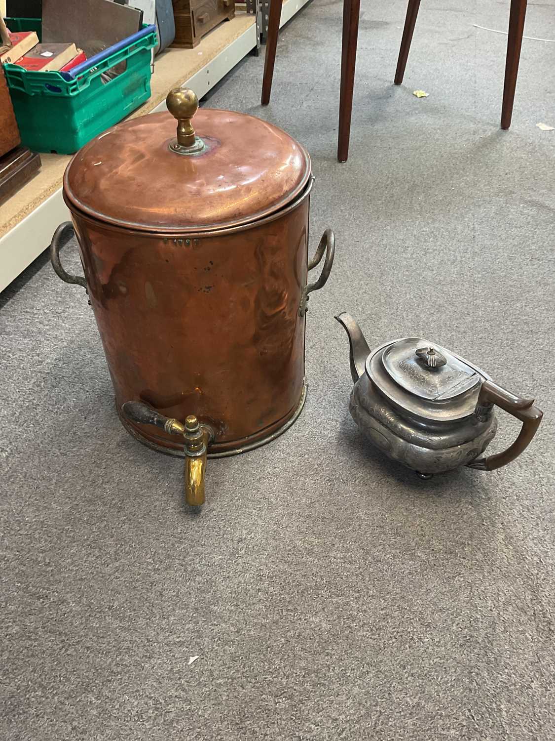 Lot 327 - A large copper tea urn with lid, height 38cm.