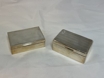 Lot 439 - Two hallmarked silver cigarette boxes of...