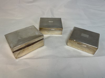 Lot 440 - Three hallmarked silver cigarette boxes,...