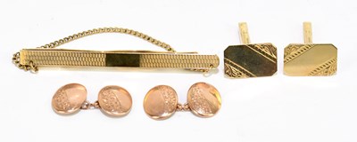 Lot 1453 - Two pairs of 9ct gold cufflinks, to include a...