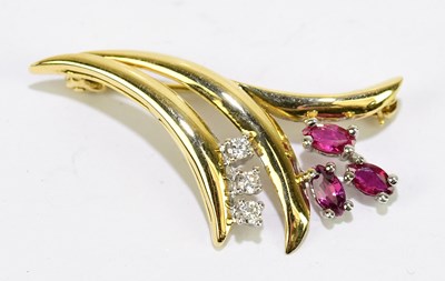 Lot 1445 - A yellow metal ruby and diamond set floral...