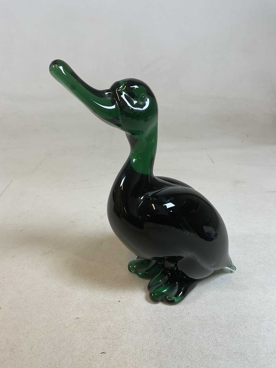 Lot 294 - A mid 20th century green glass duck model of