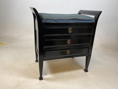 Lot 769 - An early 20th century ebonised piano stool...