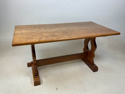 Lot 746 - A rectangular oak coffee table, modelled as a...