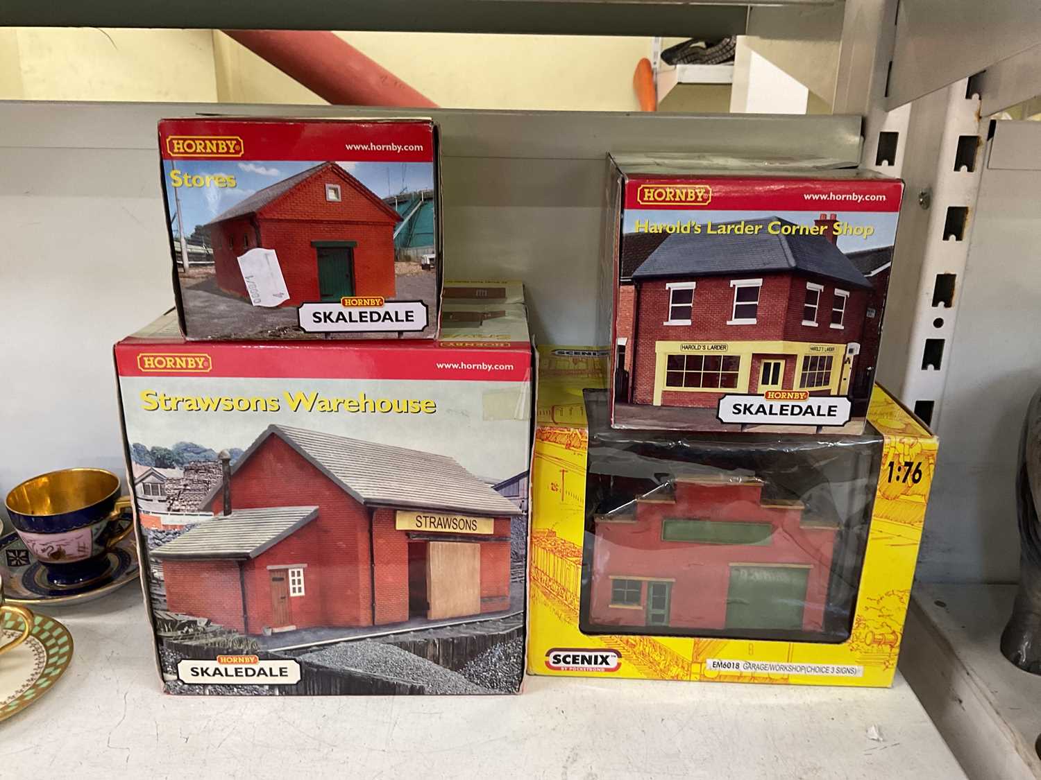 Lot 315 - Three box Hornby houses and another (4).