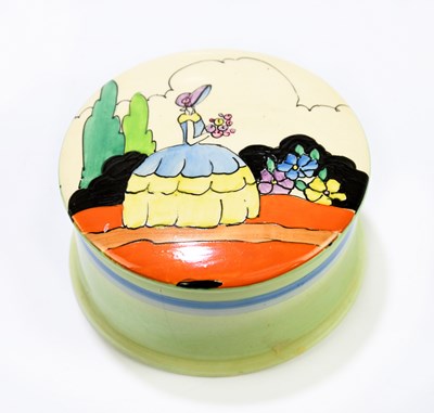 Lot 208 - CLARICE CLIFF; a circular trinket box and...