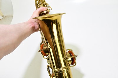 Lot 1079 - C G CONN; an alto saxophone, serial number...