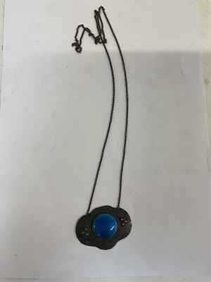 Lot 932 - An Arts & Crafts pewter and blue enamel...