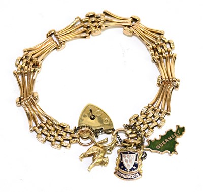 Lot 1438 - A 9ct yellow gold gate link bracelet with...