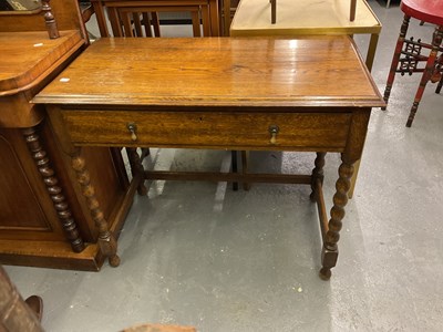 Lot 101 - A early 20th century oak single drawer side...