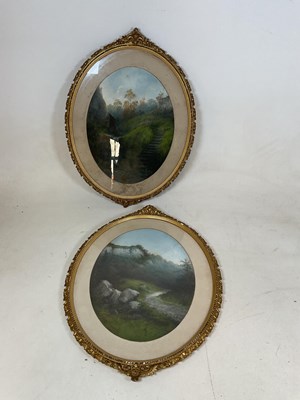 Lot 365 - J Coad A pair of oval pastel landscape...