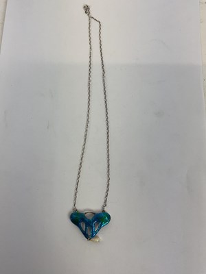 Lot 894 - An Arts & Crafts style enamelled pendant...