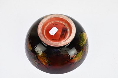 Lot 47 - MOORCROFT; a 'Hibiscus' pattern flambe bowl,...