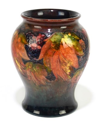 Lot 26 - MOORCROFT; a 'Leaf and Berry' pattern flambe...