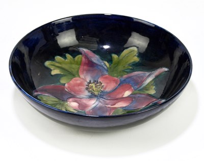 Lot 43 - MOORCROFT; a 'Columbine' pattern bowl, the...