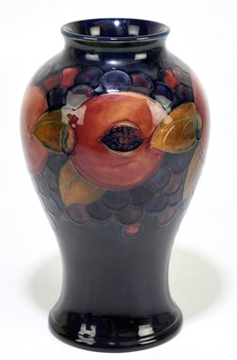 Lot 20 - MOORCROFT; a 'Pomegranate' pattern vase,...