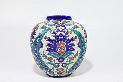 Lot 299 - LAROCHE; an Belgian Art Deco vase, brightly...