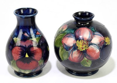 Lot 27 - MOORCROFT; a 'Pansy' pattern vase, impressed...