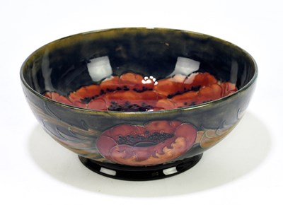 Lot 22 - MOORCROFT; a 'Poppy' pattern bowl, the...