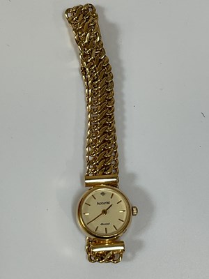 Lot 363 - ACCURIST; a 9ct gold quartz watch on 9ct gold...