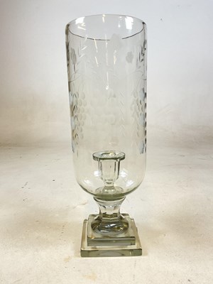 Lot 409 - A decorative glass candle hurricane shade,...